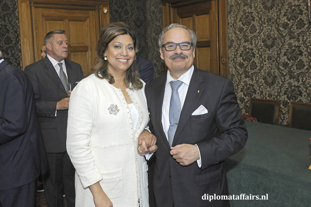 11. Mrs Shida Bliek, Portuguese Ambassador José de Bouza Serrano receiving Flame of Peace Award