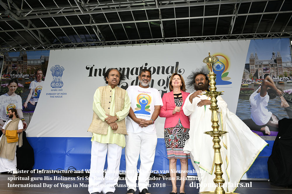 4.jpg Minister of Infrastructure and Water Management, Ms. Cora van Nieuwenhuizen, spiritual guru His Holiness Sri Sri Ravi Shankar and Ambassador Venu Rajamony Diplomat Affairs magazine